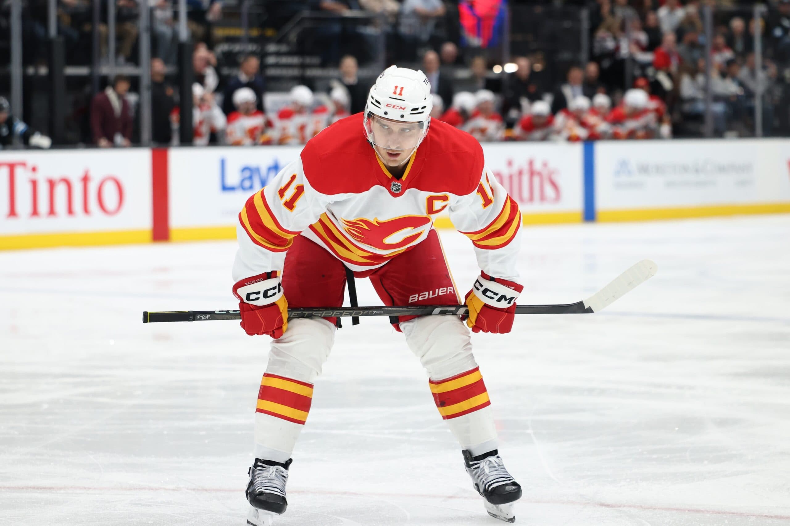 Calgary Flames center Mikael Backlund (11) waits for a face-off against the Utah Hockey Club during the third period at Delta Center.