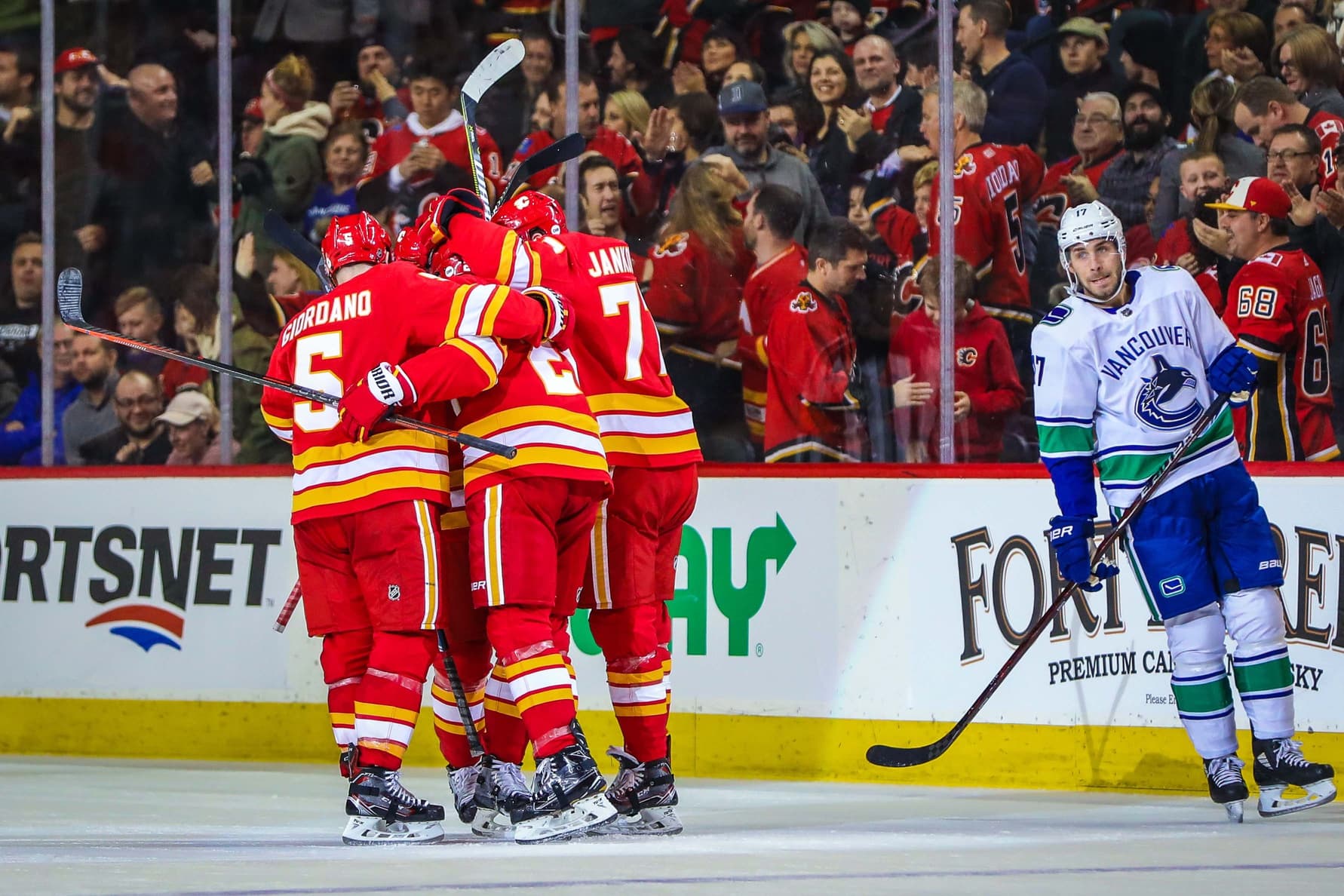 Flames celebrate.