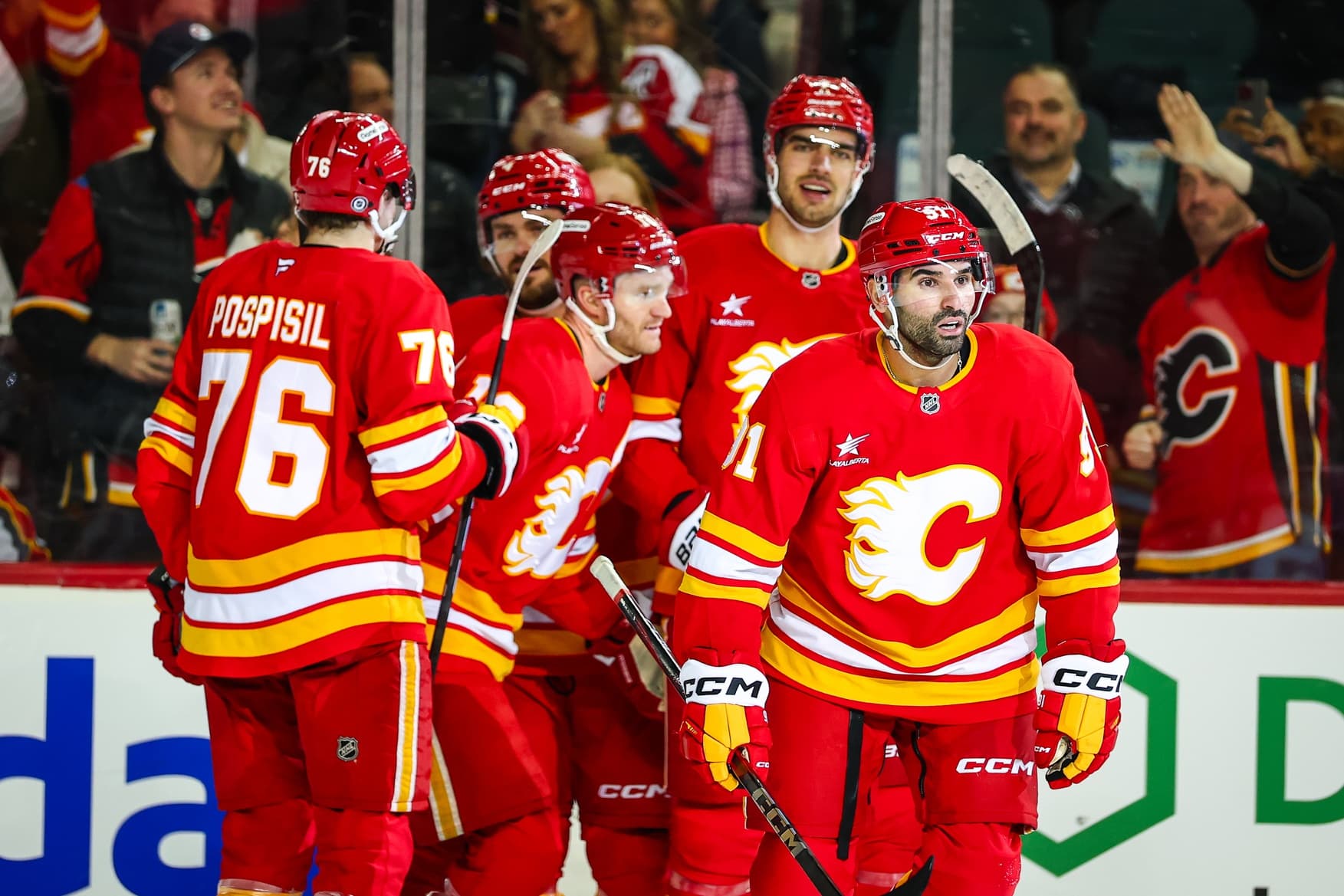 Calgary Flames center Nazem Kadri (91) celebrates his goal with teammates against the Tampa Bay Lightning during the second period at Scotiabank Saddledome.