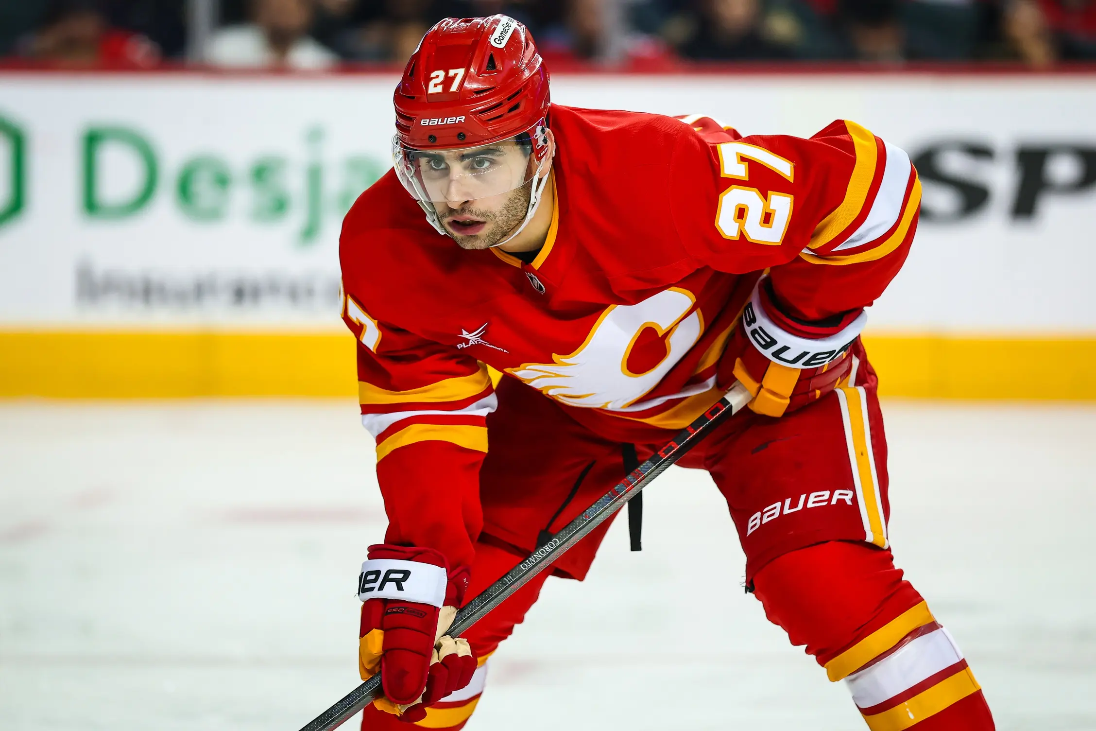 Calgary Flames right wing Matt Coronato (27) during the face off against the Ottawa Senators during the second period at Scotiabank Saddledome.