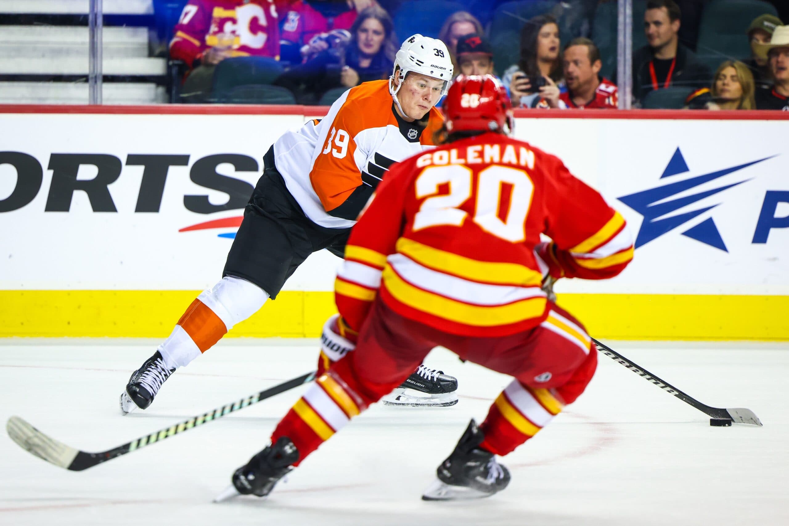 Philadelphia Flyers right wing Matvei Michkov (39) controls the puck against the Calgary Flames during the third period at Scotiabank Saddledome.