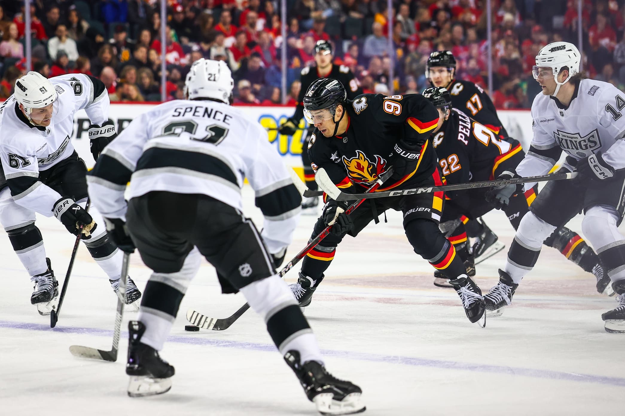 Calgary Flames left wing Andrei Kuzmenko (96) controls the puck against the Los Angeles Kings during the second period at Scotiabank Saddledome.